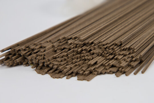close up of soba noodle on white background with selective focus