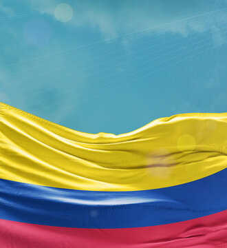 Colombia flag banner waving in the sky.