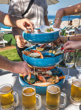 Outdoor seafood buffet with assorted dishes