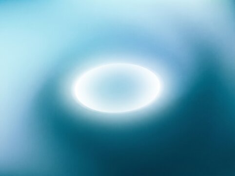 Abstract Blue Glowing Light Ring Vortex Background