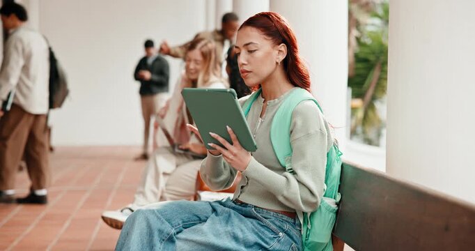 Student, woman and revision at college with tablet, digital learning platform or ebook for education. Outdoor, person and prereading on campus with tech, app or online textbook for university course.