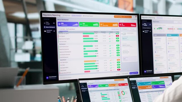 Financial Analyst Reviews Regulatory Reports On Laptop