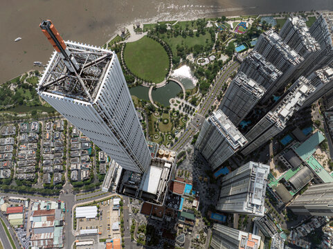 Top down view of Landmark 81 and riverside urban park, Ho Chi Minh City, Vietnam