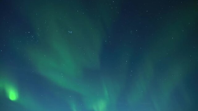 Mesmerizing Green Aurora Borealis Dancing Across the Night Sky