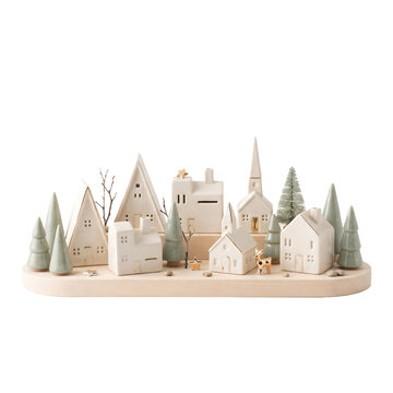 Charming ceramic winter village scene with illuminated houses and trees isolated on transparent background