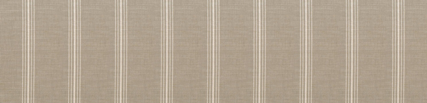Taupe brown linen fabric texture highlighted by fine white vertical stripes in a flat lay