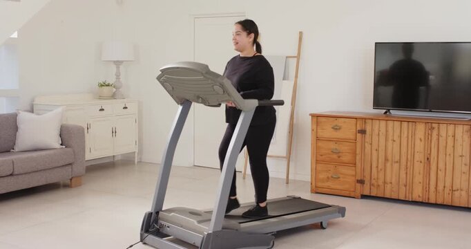 Lifestyle videos indoor of people doing activities at home, exercising on treadmill, woman in active