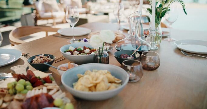 Celebration, food or charcuterie board outdoor with snack, fruit arrangement or meal setup at event. Party, nutrition or catering with platter, cuisine or appetizer selection in backyard gathering.