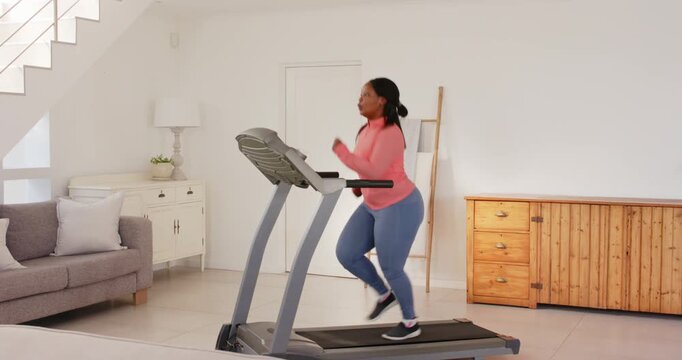 Lifestyle videos indoor of people doing activities at home, running on treadmill, woman exercising