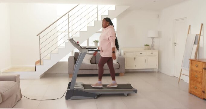 Lifestyle videos indoor of people doing activities at home, running on treadmill, woman exercising