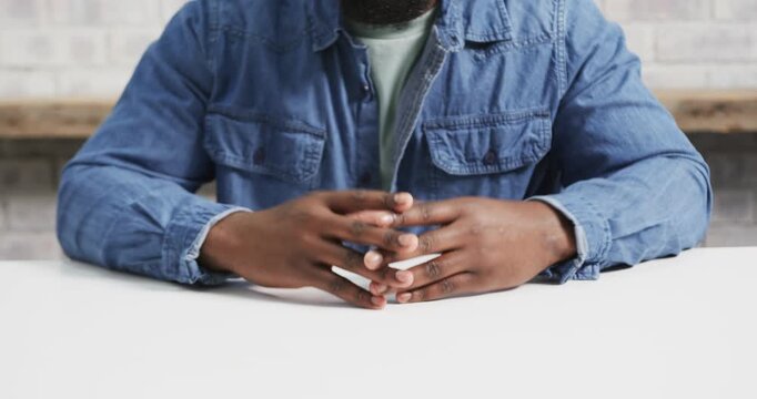 Close up of people talking to the camera, gesturing with hands, man in denim shirt discussing busine