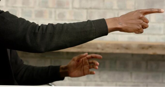 Close up of people talking to the camera, gesturing with hand, person during meeting or presentation
