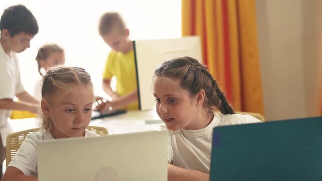 children learn from home lifestyle through computers. business concept of modern training and development. group of little kids perform tasks in a laptop at home schooling. educating at home