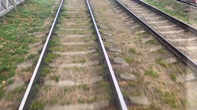A journey by a tram: endless railways. Commuting in the city