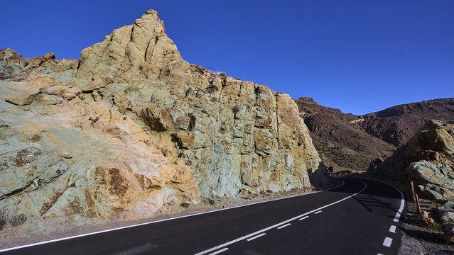 Mirador Azulejos II, sweeping road leads along colorful rock formations, Teide, Parque Nacional del Teide, Teide National Park, volcano, volcanism, UNESCO World Heritage Site, Tenerife, Canary Islands, Spain