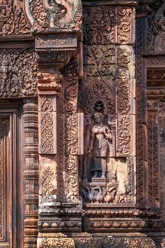 Detail of bas-relief stone carvings in Banteay Srei temple, the citadel of women in Angkor, Siem Reap, Cambodia