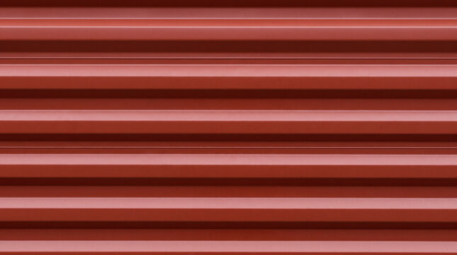 Red cargo container corrugated steel wall