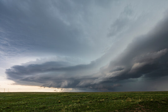 Supercell storm forming over grassy plain near pine bluffs wyoming USA