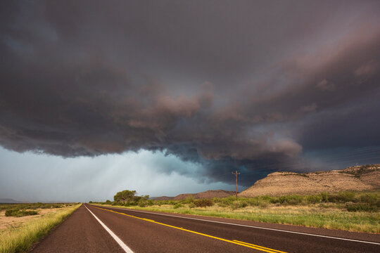 Storm clouds approaching along TX Highway 90 in sanderson texas