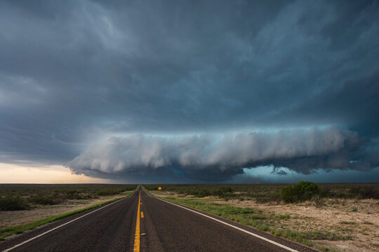 Mesocyclone storm cloud over road in dryden, texas