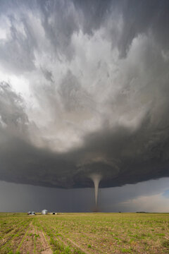 Tornado forming over stormy farm field in dickens, nebraska