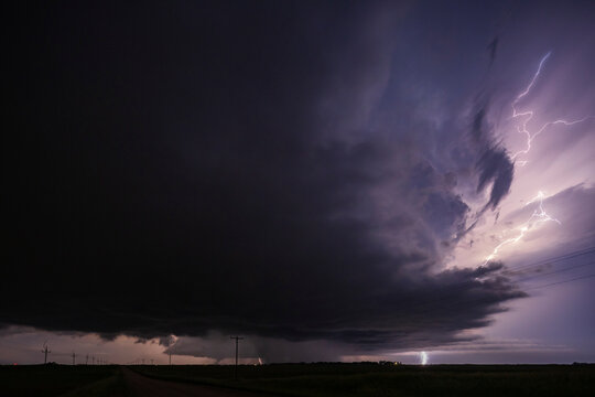 Tornado touching ground with Lightning