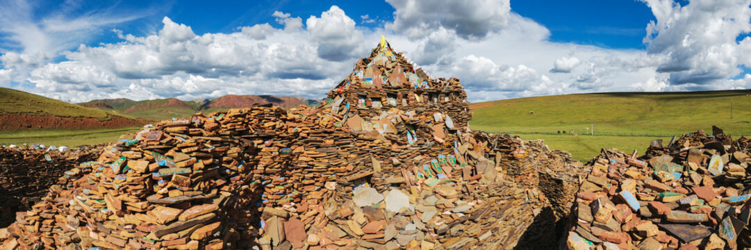 Mani Wall of stacked prayer stones in songge mani shijingcheng