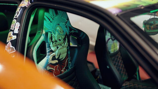 Goku from Dragon Ball anime wrapped car seat headrest