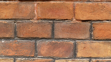 Obraz premium Old red brick wall texture. Weathered clay blocks masonry background full frame.