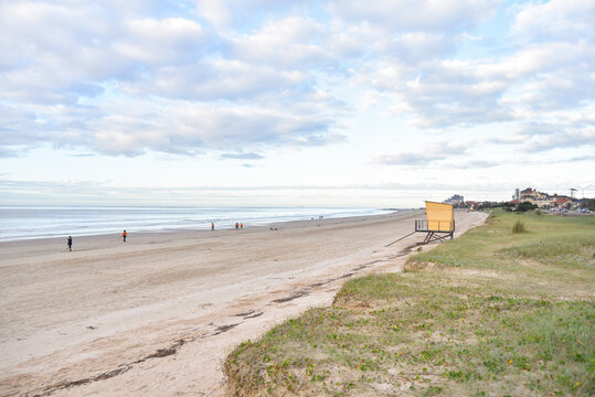 People Picking up Trash on the Beach in Montevideo&rsquo;s Suburb Carrasco in Uruguay