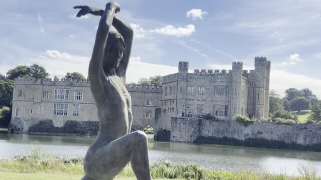 Bronze female figure near moat detail