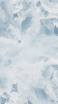 Epic Clouds And Smoke Vertical Background Animation
A white and grey stormy sky background with clouds smoke and fume flowing on a zoom out motion for an epic intro background