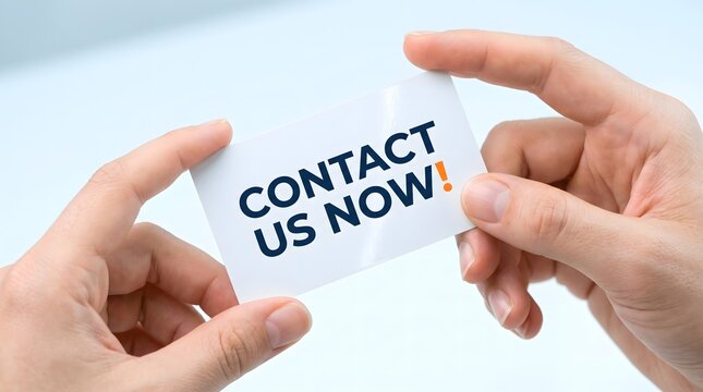 Hands Holding Contact Us Now Business Card Close Up