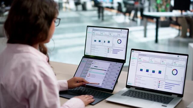 Insurance Adjuster Reviews Claims Dashboard On Laptop