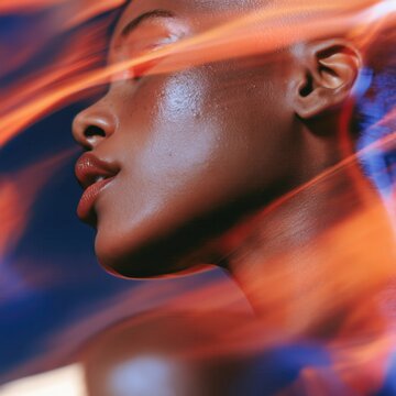 Artistic portrait of a woman surrounded by flames of passion
