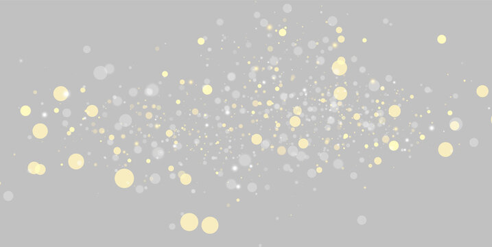 A scattering of yellow and gray glowing bokeh dots floats across a black background. The dots vary in size and intensity, forming a diffuse horizontal cluster.