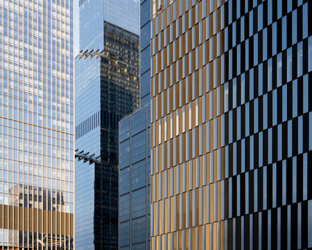 Exterior view of several adjoining business office towers at Hudson Yards in Manhattan.