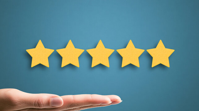 A hand presenting five golden stars against a blue background, symbolizing quality, ratings, and customer satisfaction. Perfect for any business or service-oriented context.