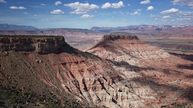 Experience aerial hyperlapse views of Zion National Park captured from Gooseberry Mesa in Utah showcasing changing clouds and landscapes.