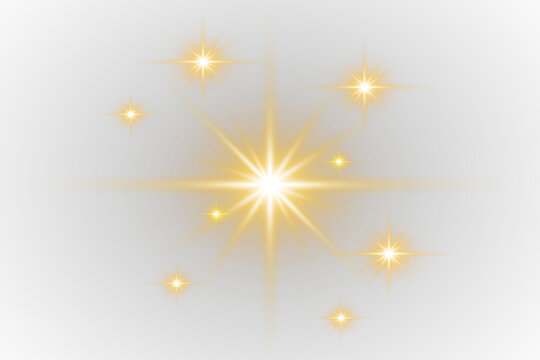 Golden glowing radiant star glitter effect overlay with sparkling light starburst particles and luminous stars festive shine on transparent background
