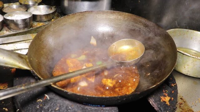 Traditional Indian Street Food Cooking in a Kadhai.