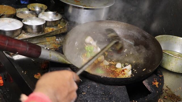 Traditional Indian Street Food Cooking in a Kadhai.