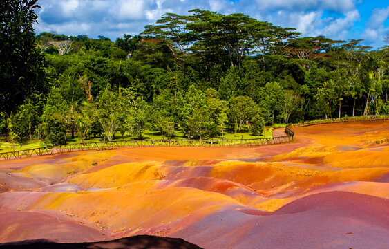 Chamarel Seven Colored Earth Geopark in Mauritius Island. Colorful panoramic landscape about this volcanic geological formation Chamarel Seven Colored Earth Geopark in Riviere noire district.