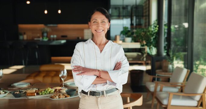 Host, face and woman in house with arms crossed, unwind and confidence with dinner preparation. Wellness, happy and mature person with party planning, peaceful moment and satisfaction on day off.
