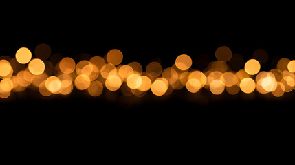 Obraz premium A black background with golden bokeh lights in a horizontal band.
