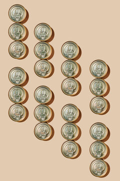 clusters of food cans on a beige background