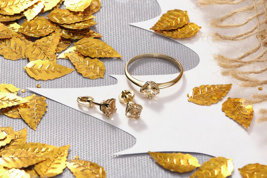 Elegant jewelry set. Jewellery set with gemstones. Jewelry accessories collage. Product still life concept. Ring, necklace and earrings.