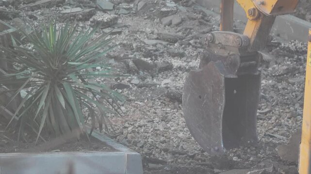 Industrial Excavator Bucket Clears Demolition Rubble and Gravel Vertical video