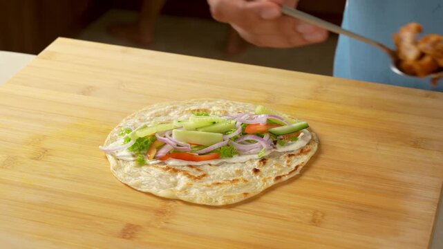 Chicken Added to Salad-Filled Paratha