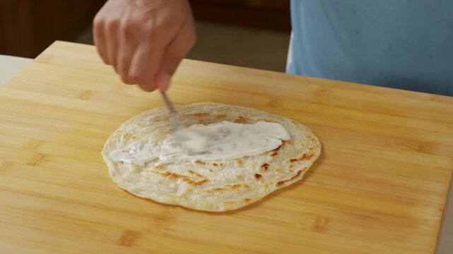 Mayonnaise Spread on Paratha for Roll